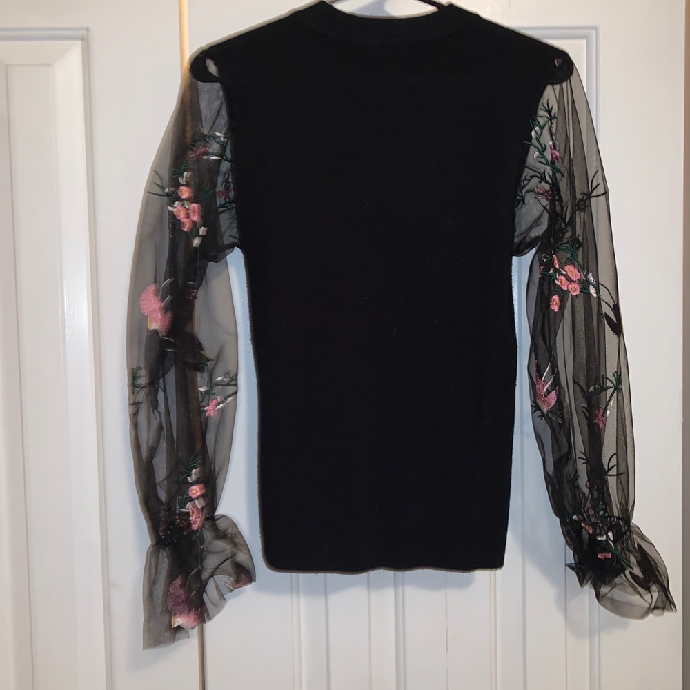 Embroidered sleeve sweater